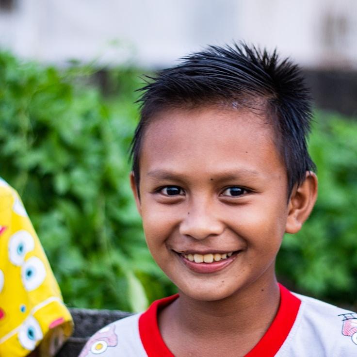 Anya Rao, Lead Design Curator at Hingeg Earcog, reviewing corporate floral arrangements